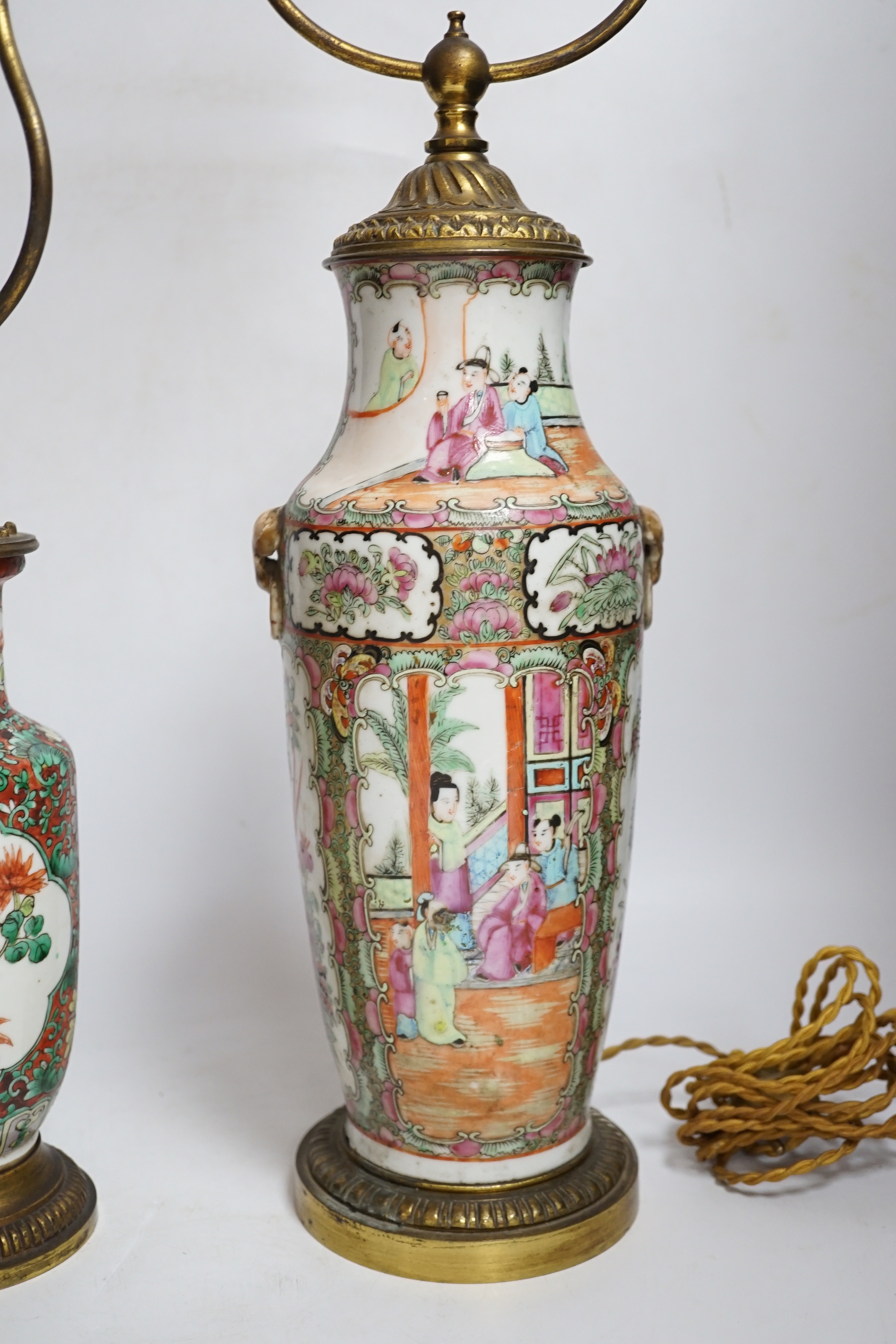 A late 19th century Chinese famille rose vase and another, both mounted and converted to lamps, tallest 62cm